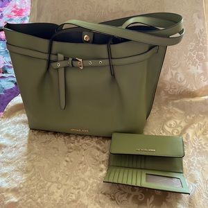 Michael Kors purse with matching wallet.